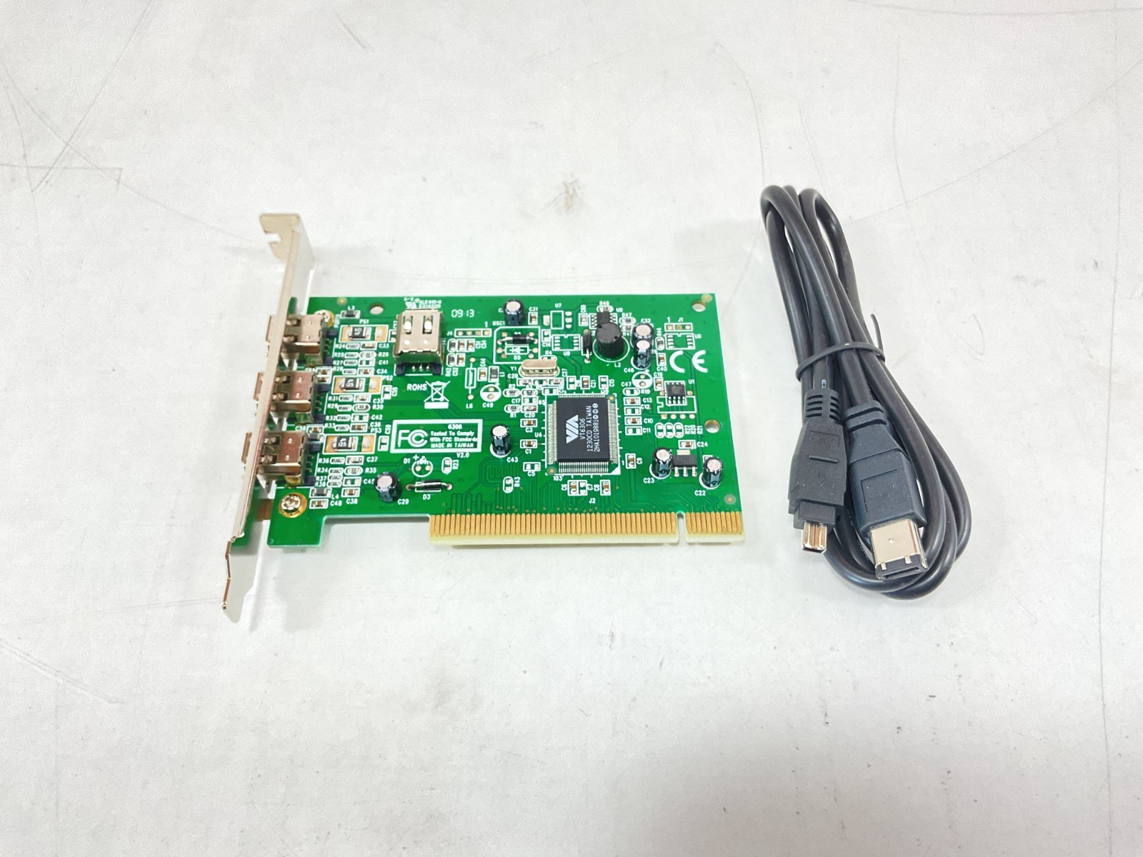 StarTech 4-Port PCI 1394a FireWire Adapter Card – PCI1394MP