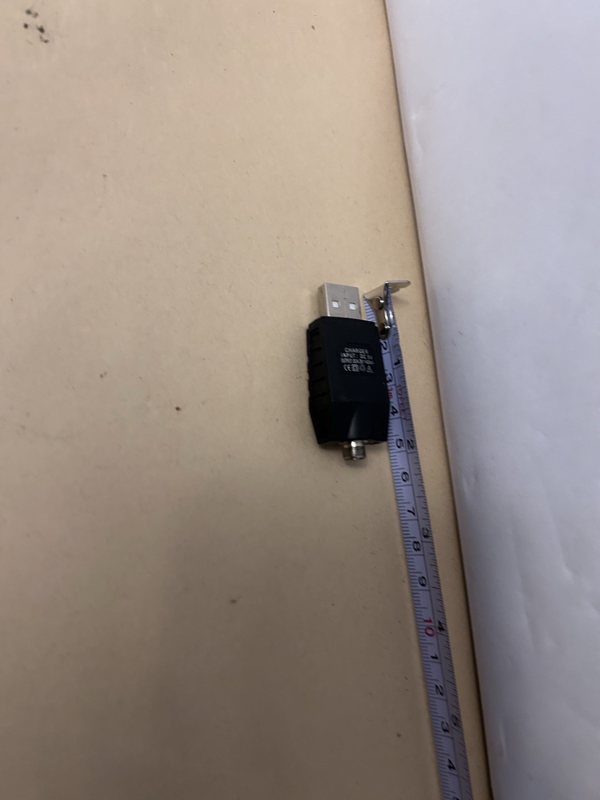 Untested Unbranded USB twist plug chager DC 5V Black